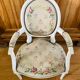 Upholstered armchair with cross-stitch in the Louis XVI style, 19th century.