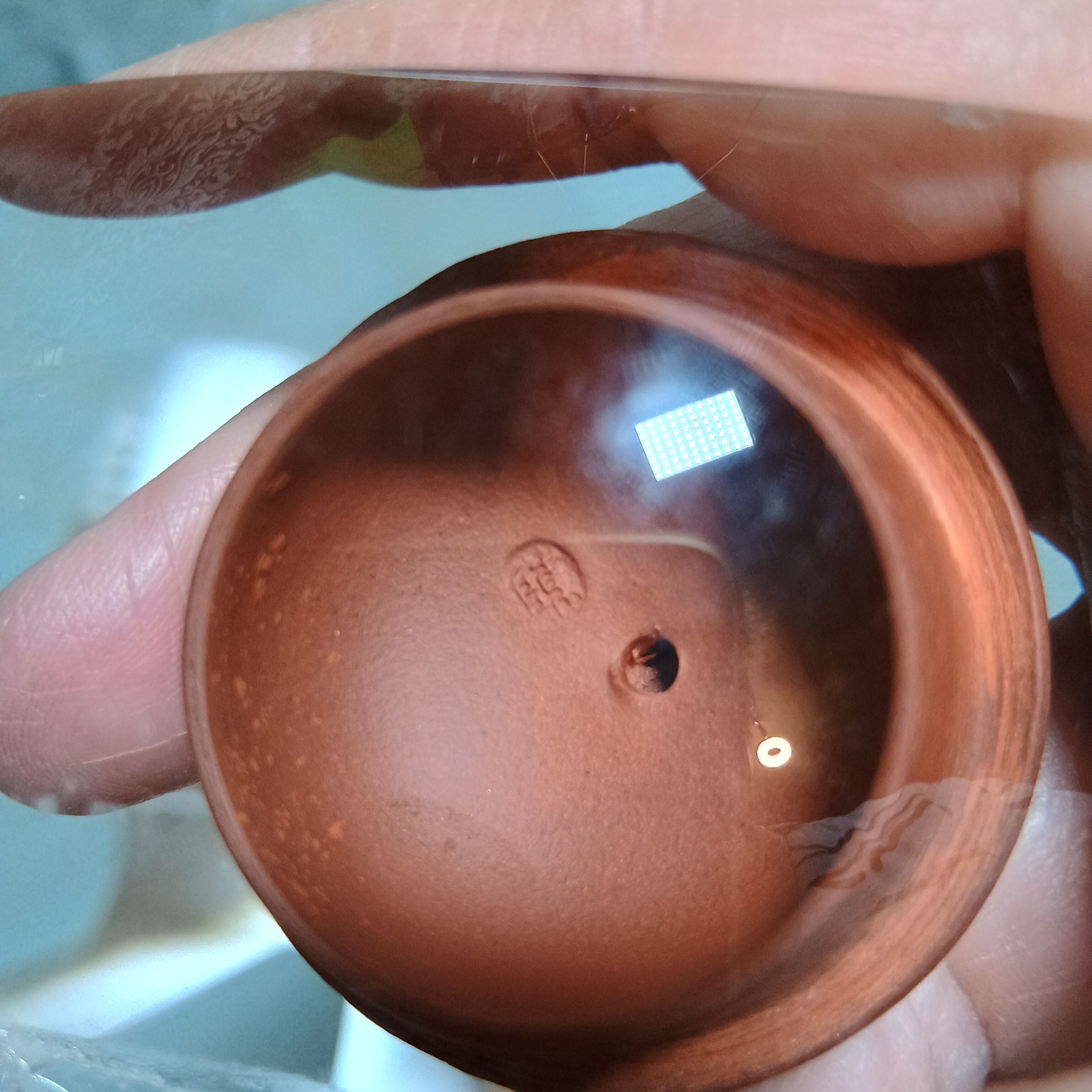 Yixing teapot in signed red clay