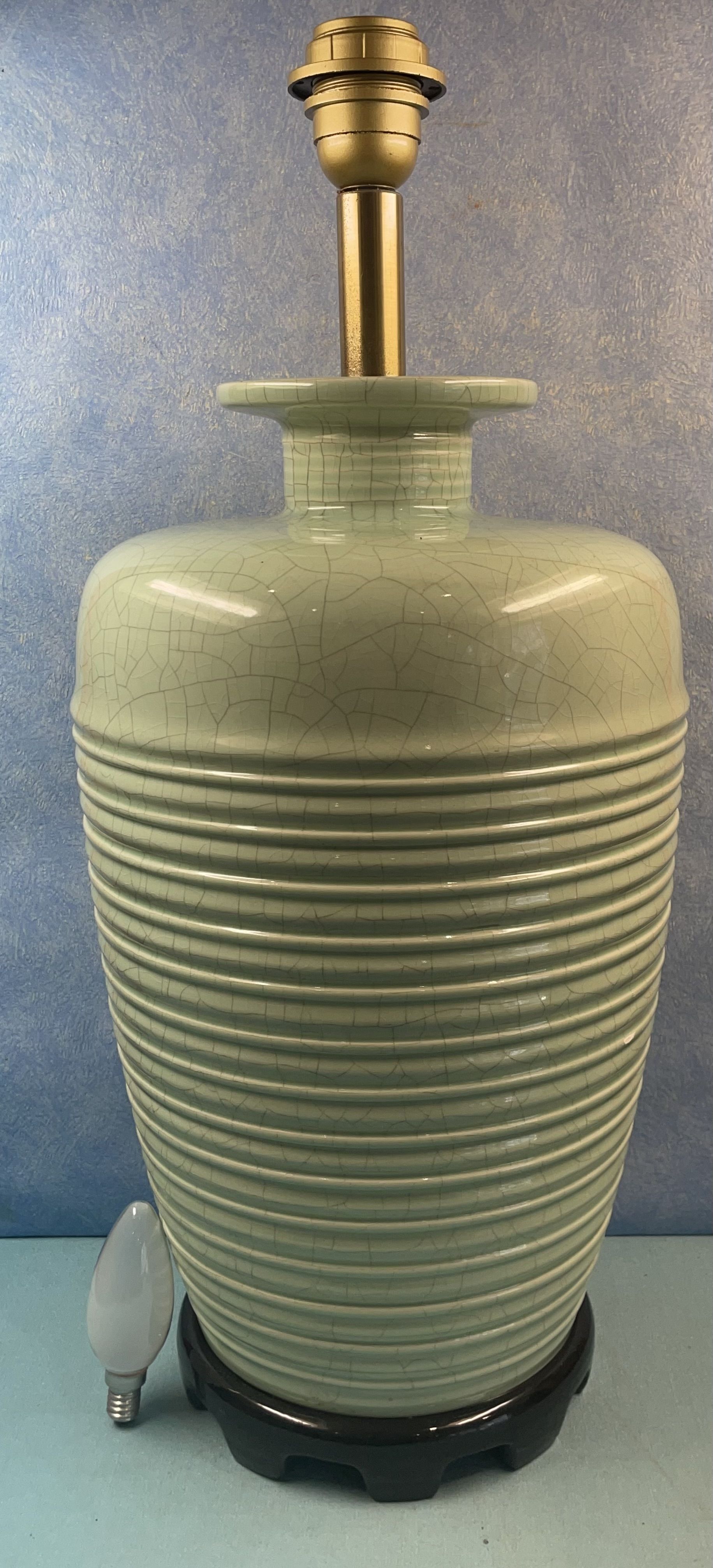 Contemporary ceramic lamp foot in green celadon color to electrify