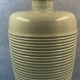 Contemporary ceramic lamp foot in green celadon color to electrify