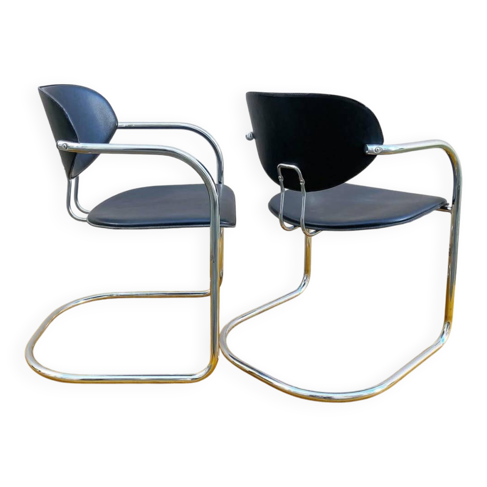 Pair of Effezeta chairs, tubular structure, chrome and black skai