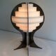 Modernist lamp in plexiglass and white plastic strips.