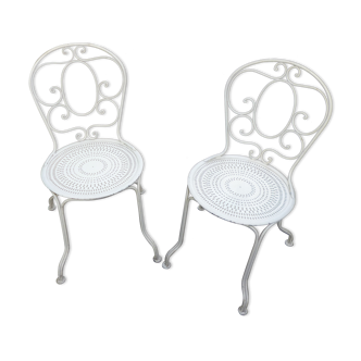 Pair of old wrought iron garden chairs