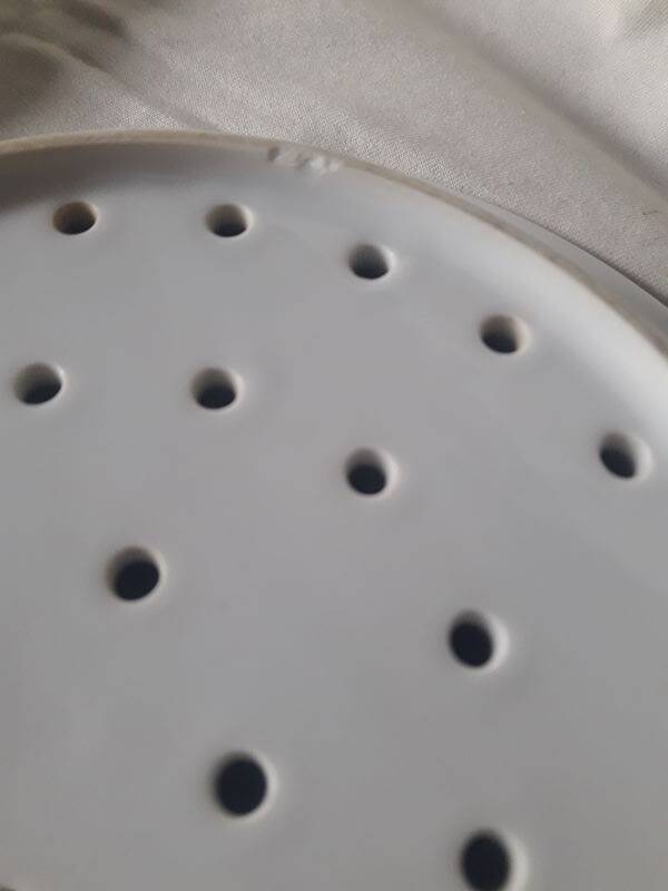 White porcelain drainer and dish