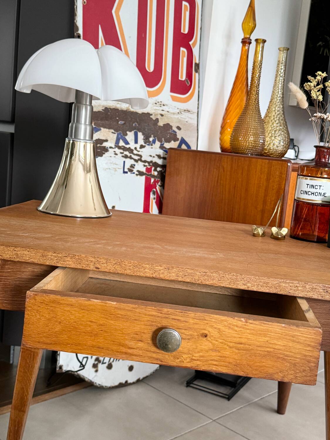 Old wooden desk or side table with compass legs