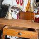 Old wooden desk or side table with compass legs