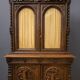 Two-body buffet in solid oak, richly carved in the Renaissance style.
