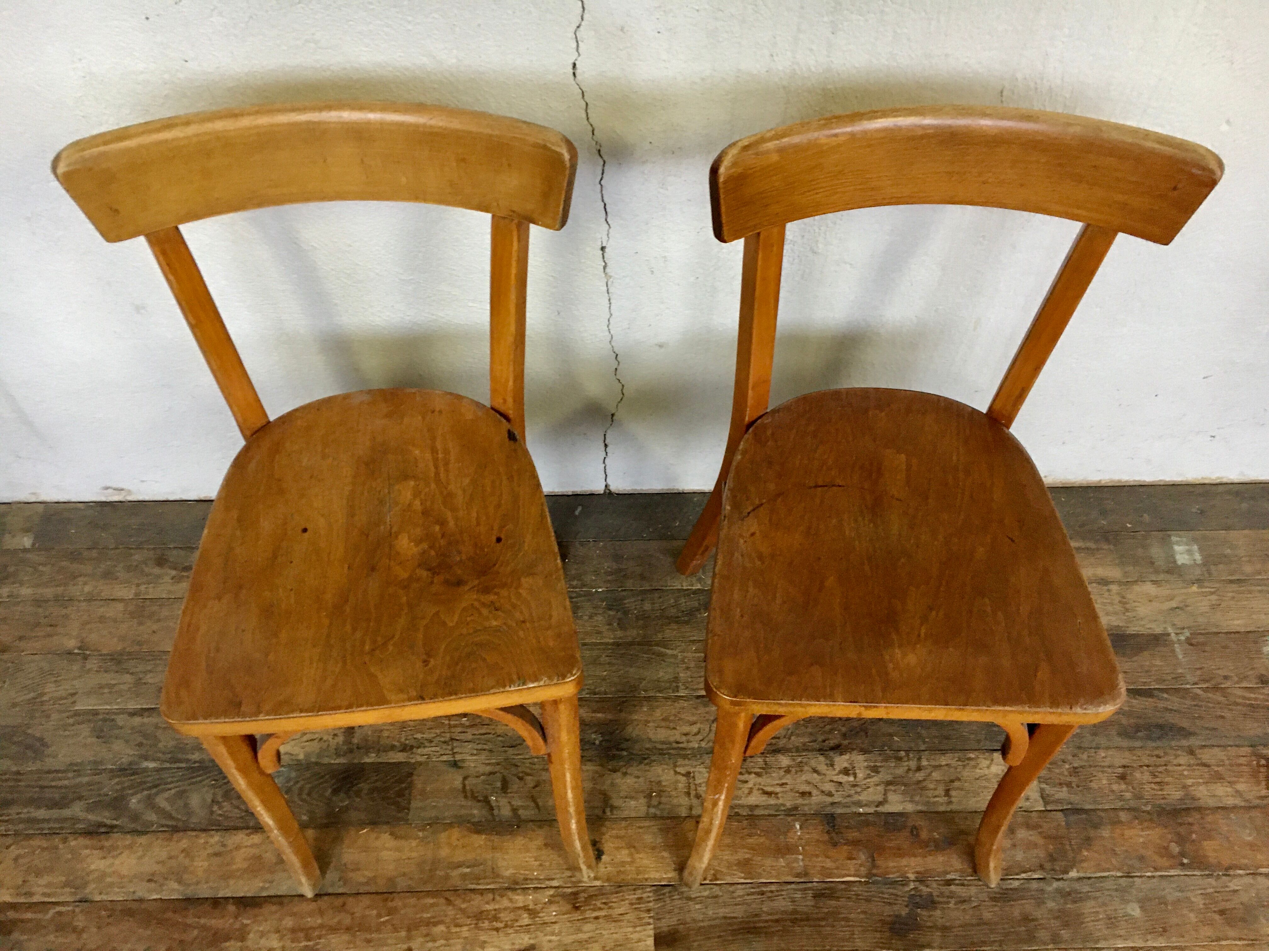 Pair of vintage clear beech baumann chair