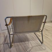Scandinavian living room armchair in tubular chrome and leather