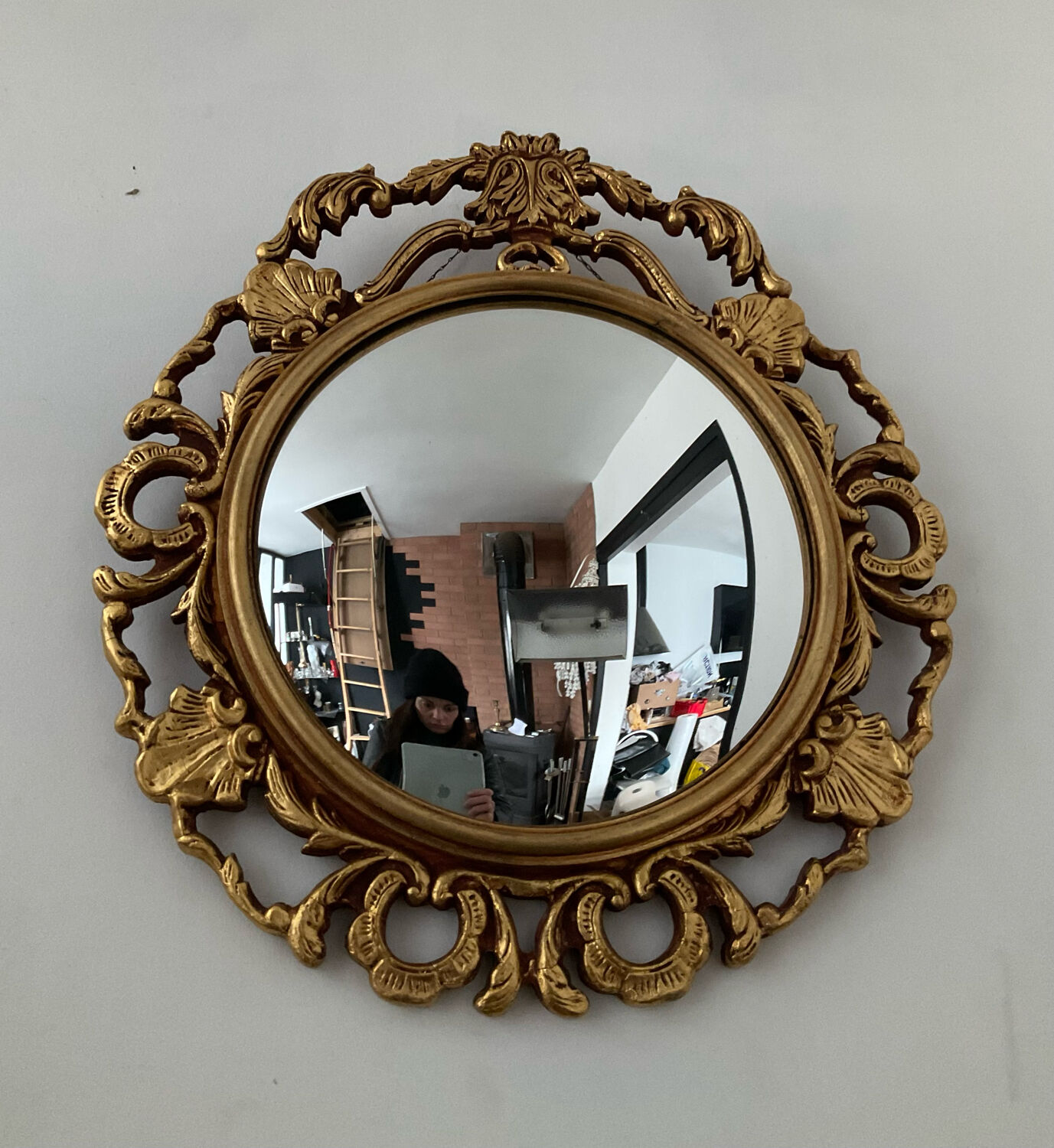 Ancient witch's eye mirror Dollanzo Italy in gilded wood