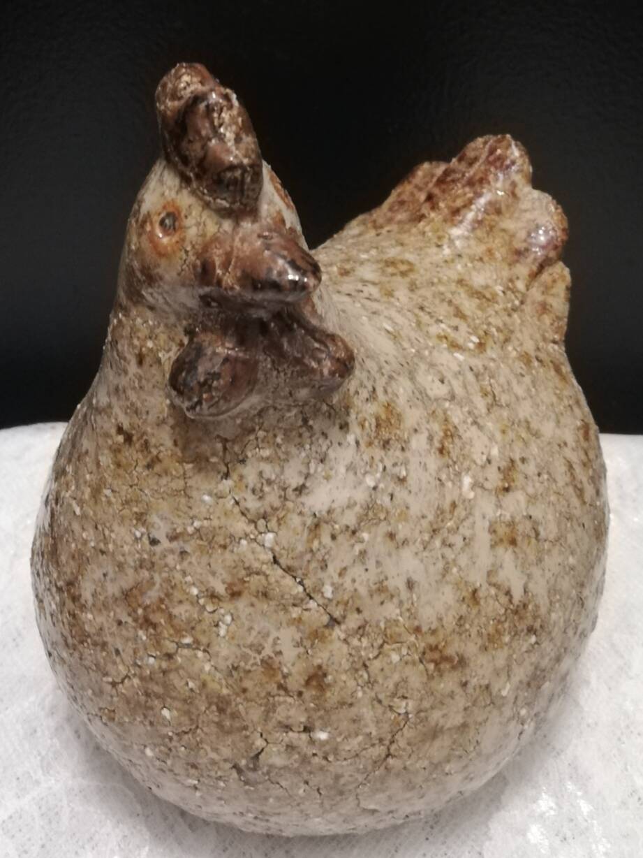 Cracked stoneware hen