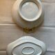 Deux plats en porcelaine rose saumonée et liseré or circa 1900