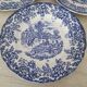 4 earthenware plates with floral and pastoral scene motif
