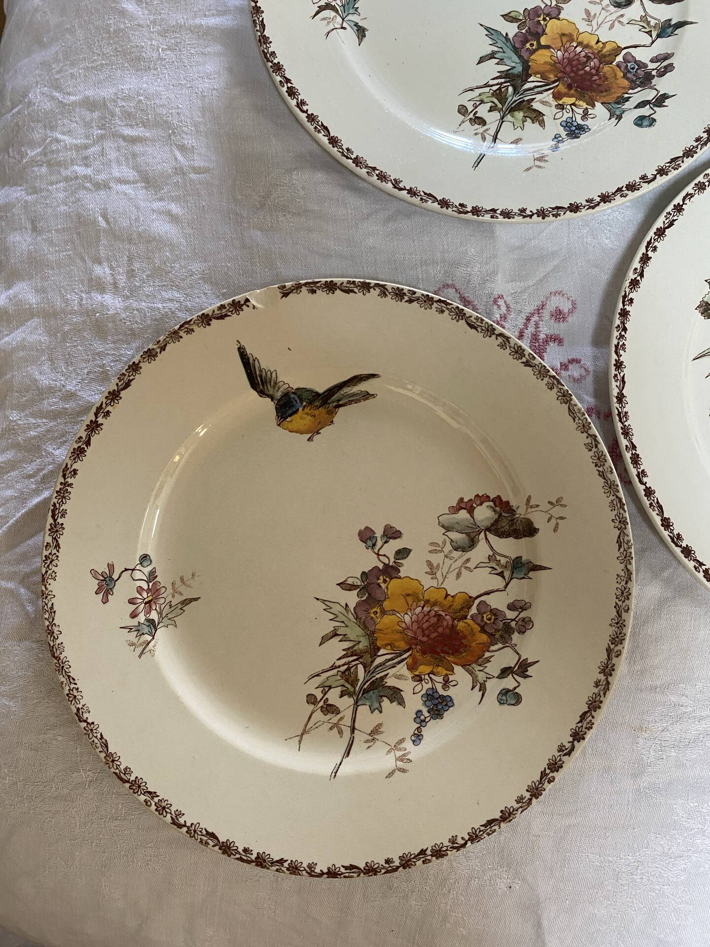 Set of 3 flat plates in polychrome ironstone E. Bourgeois