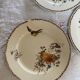 Set of 3 flat plates in polychrome ironstone E. Bourgeois