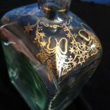 Glass liquor carafe with pattern and gilding.
