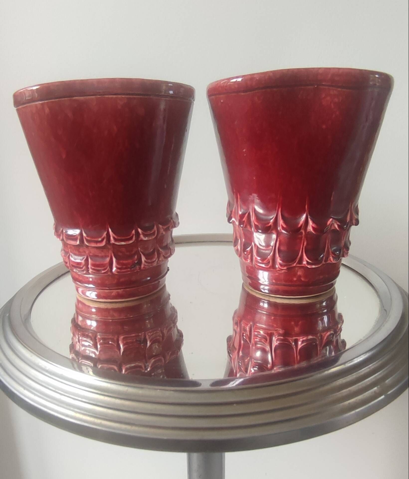 Pair of Art Deco asymmetrical red oxblood ceramic vases
