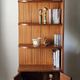 Vintage teak corner bookshelf