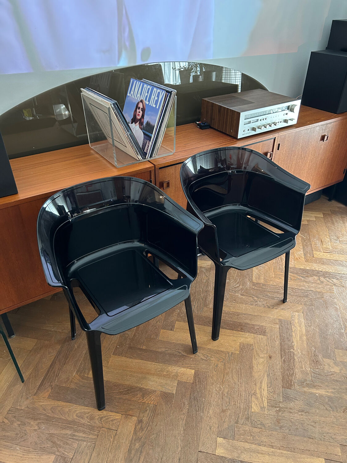 "Papyrus" black armchairs designed by Ronan and Erwan Bouroullec.