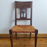 Armchair, low carved chair from the 19th century - decorated with wheat ears.