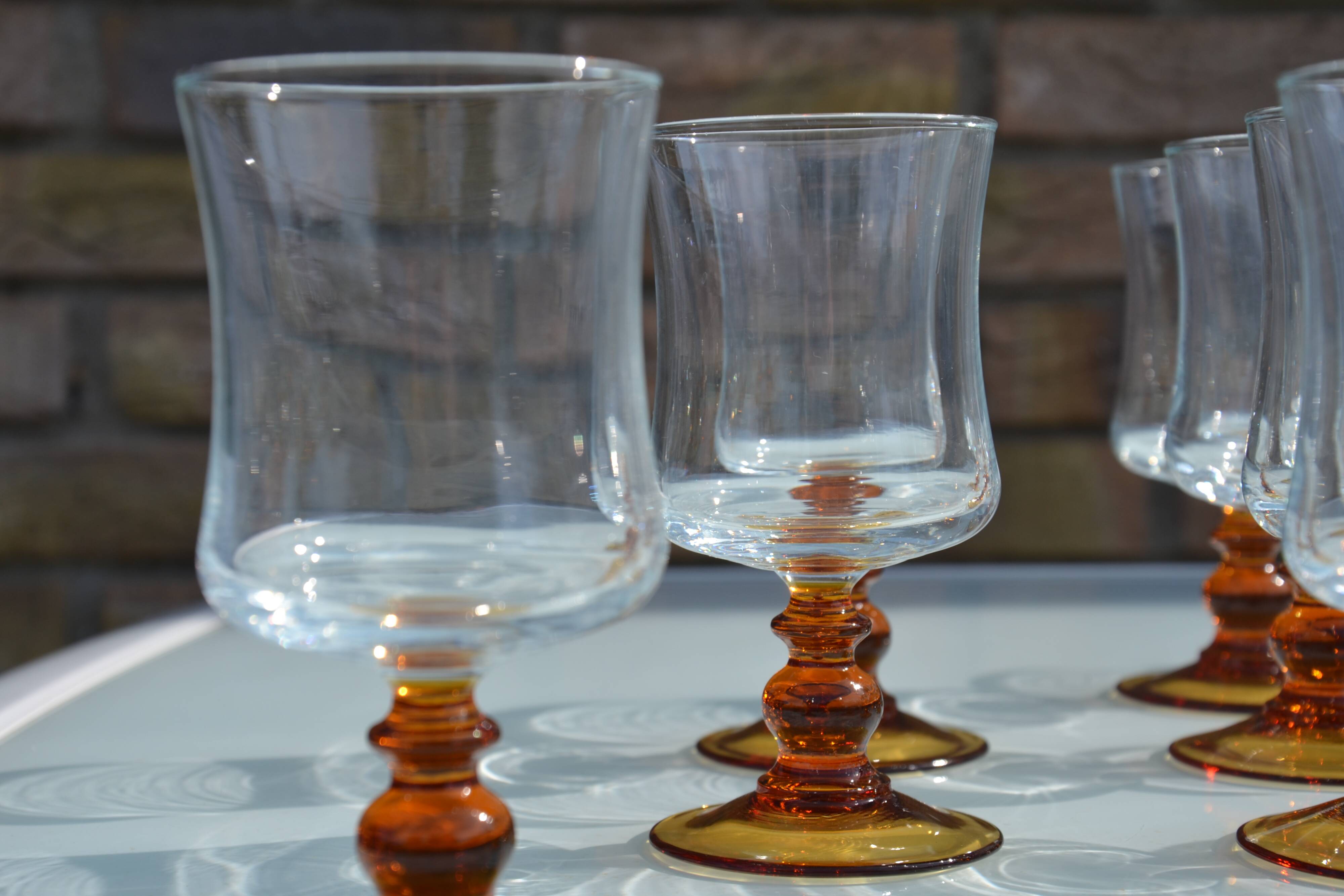 Ochre stemmed glasses from the 70s