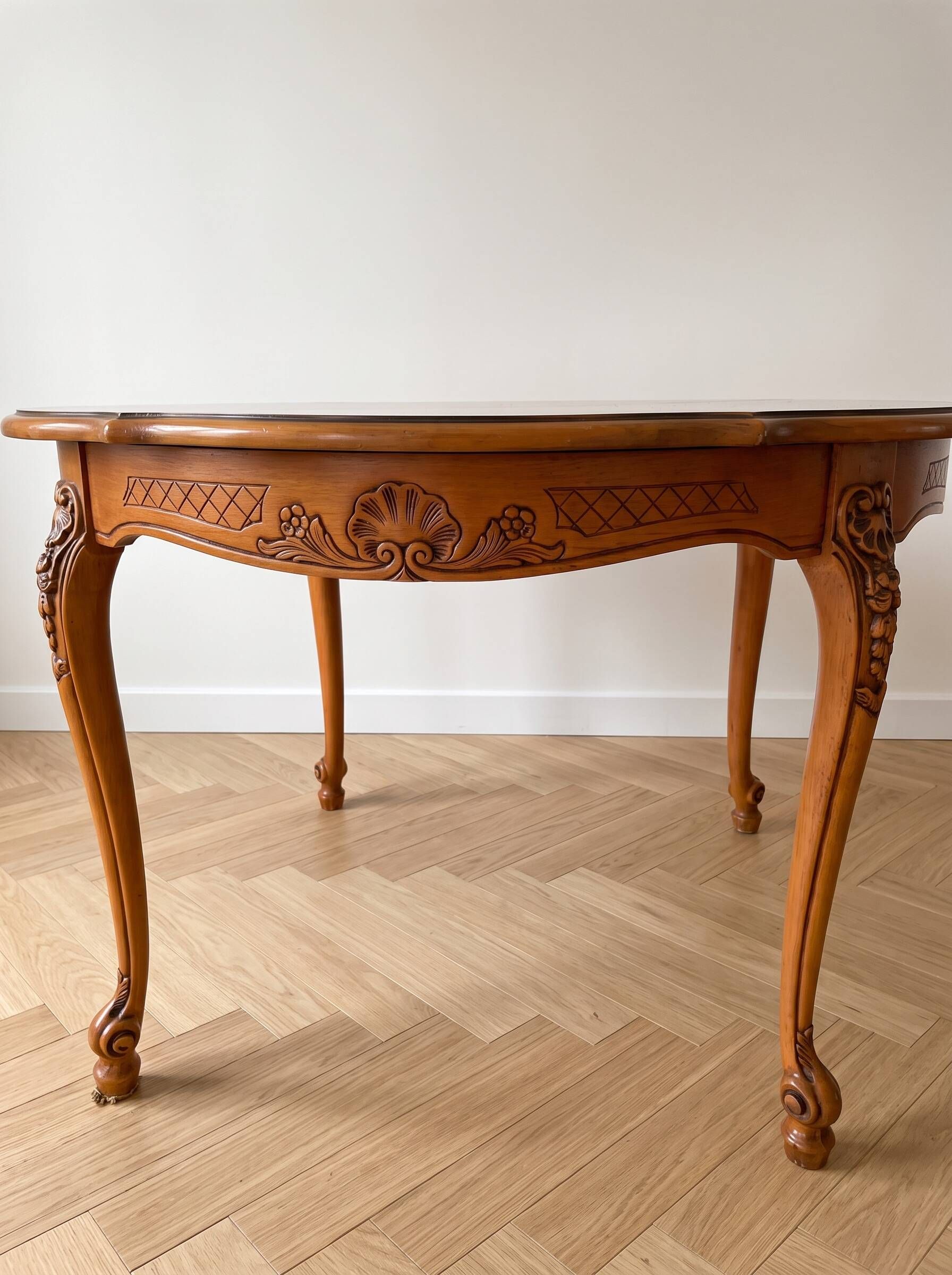 Round Louis XV dining table in solid cherry wood.