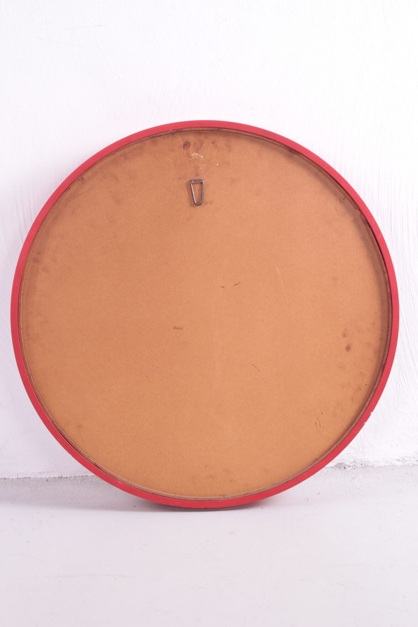 Vintage red round plastic mirror from the 1960s.