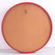 Vintage red round plastic mirror from the 1960s.