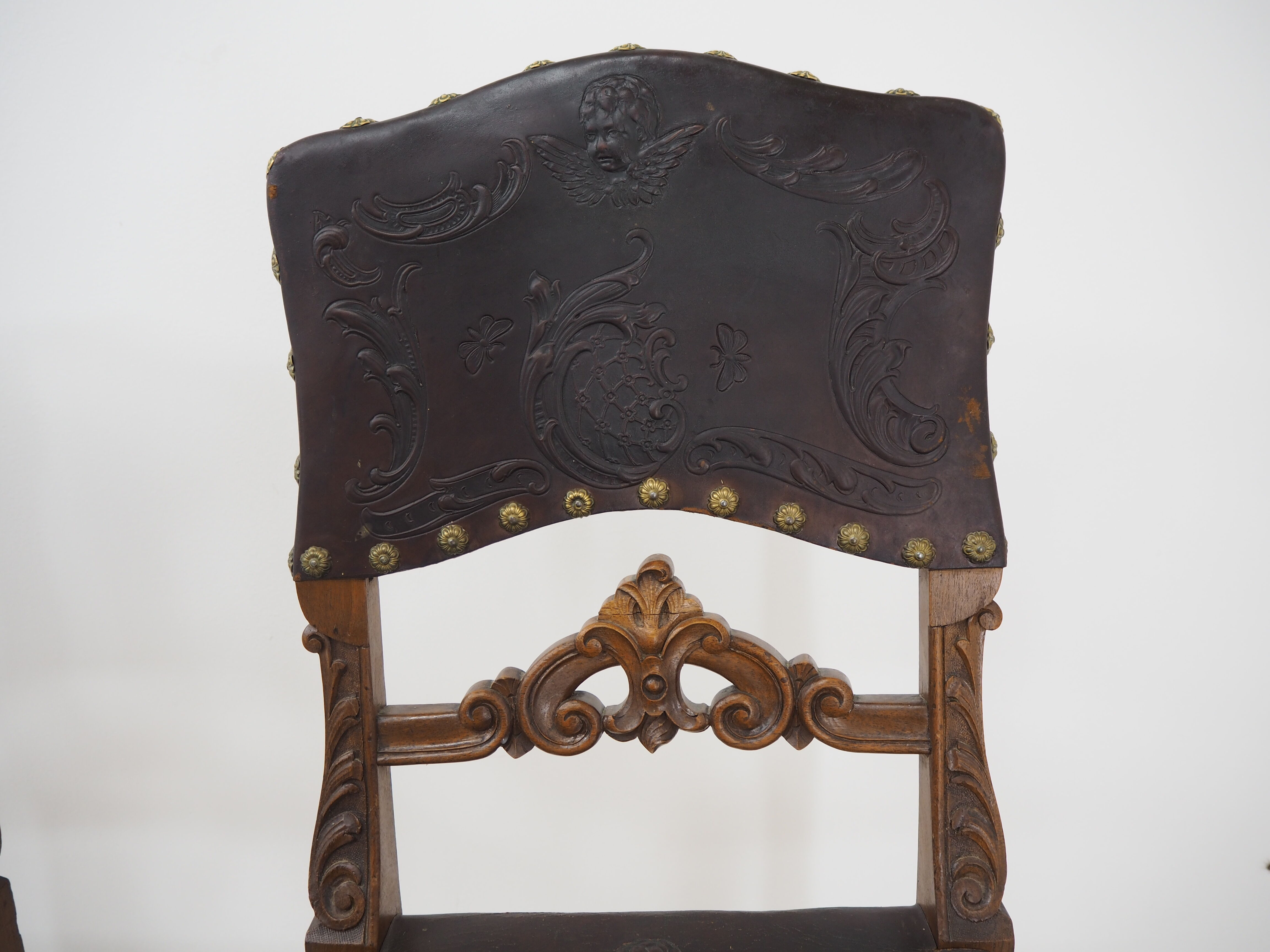 Pair of Antique Embossed Leather Chairs