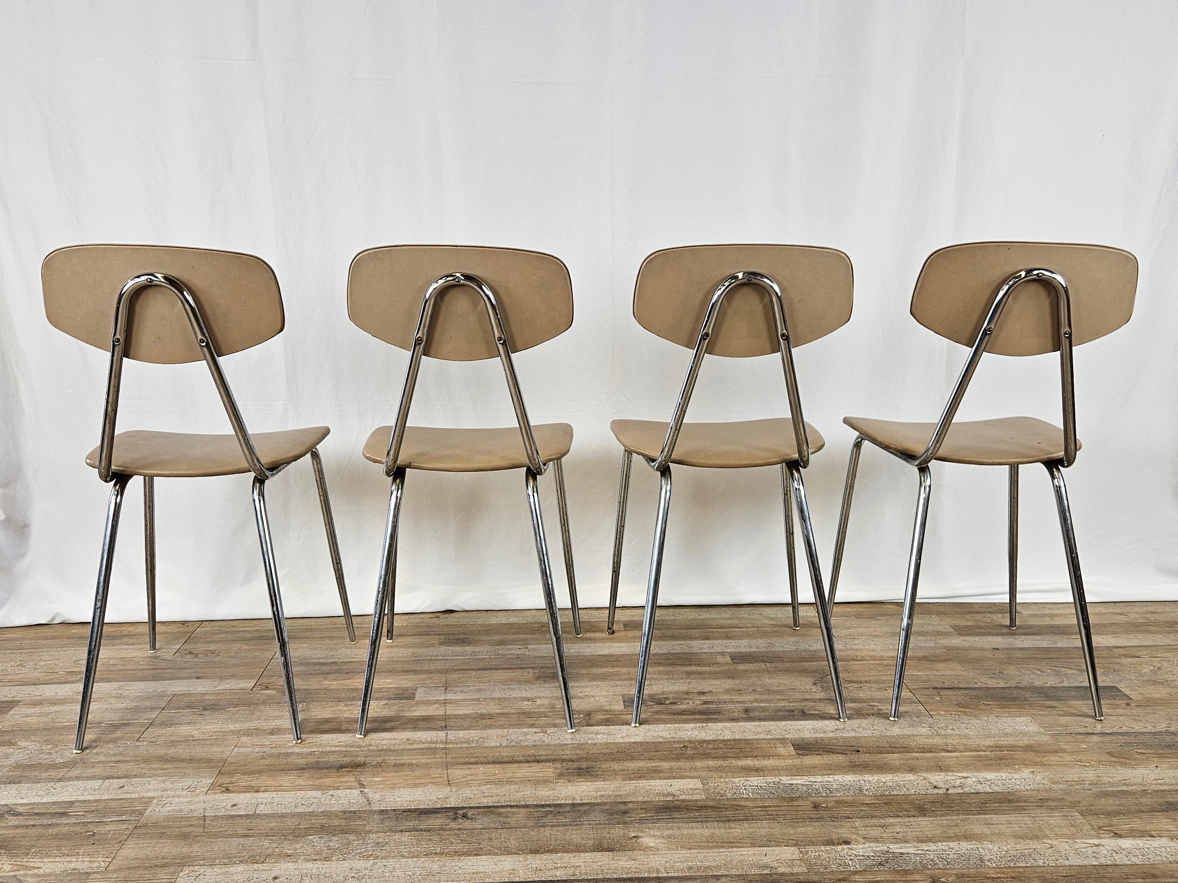 Set of four chairs in iron and skai 1970