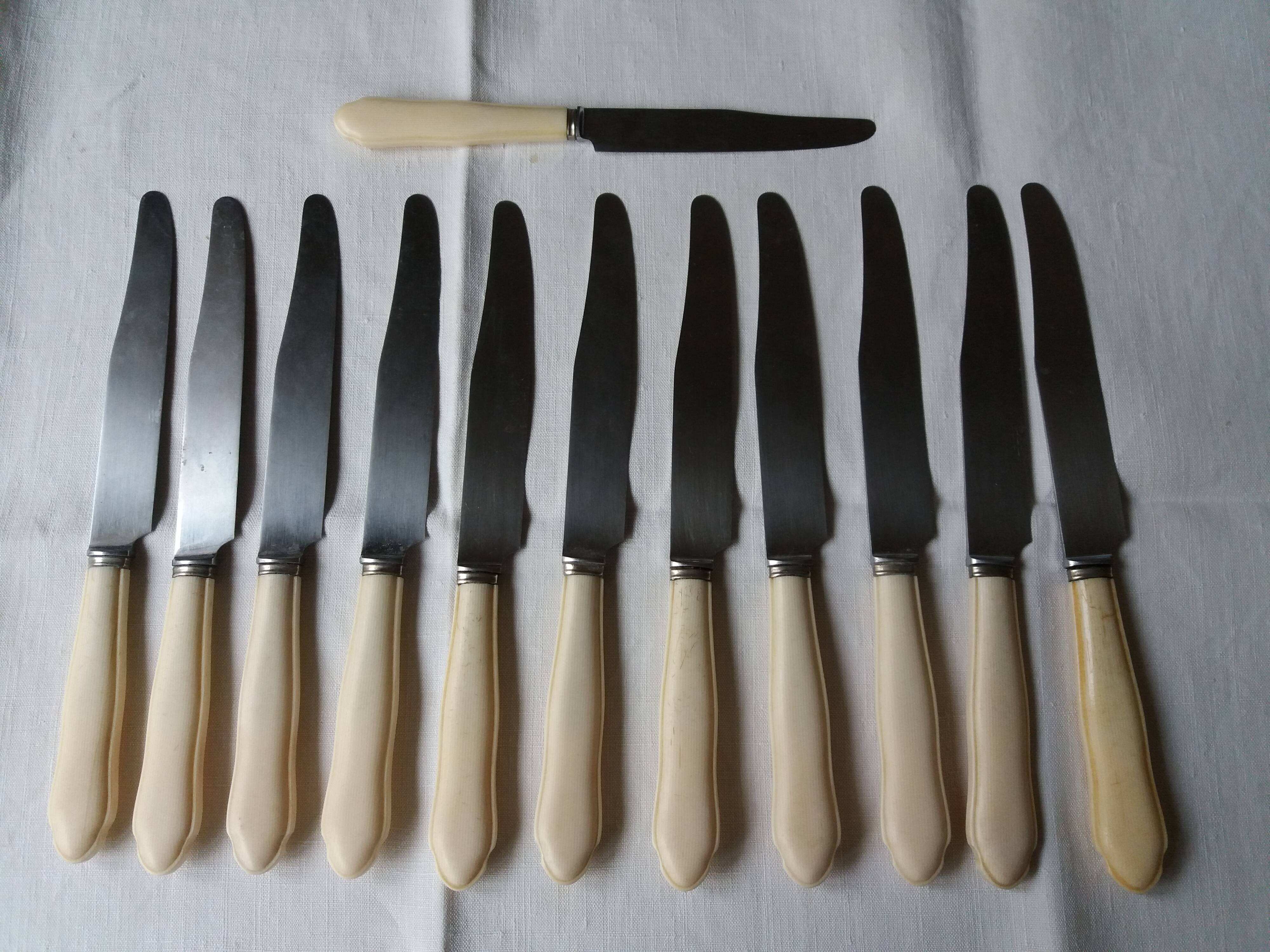 Set of twelve art deco knives with ivory handle