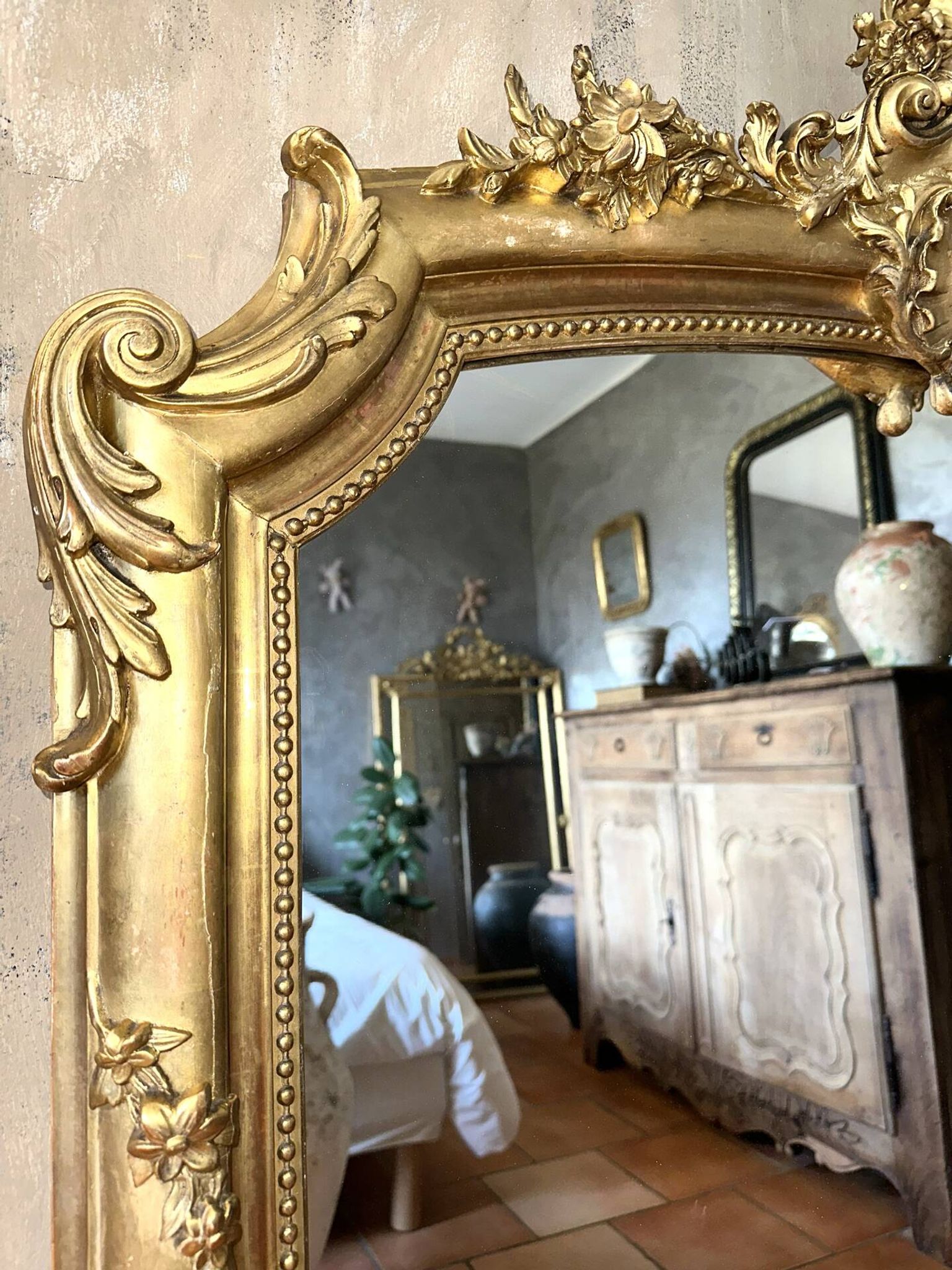 19th-century gilded antique pediment mirror