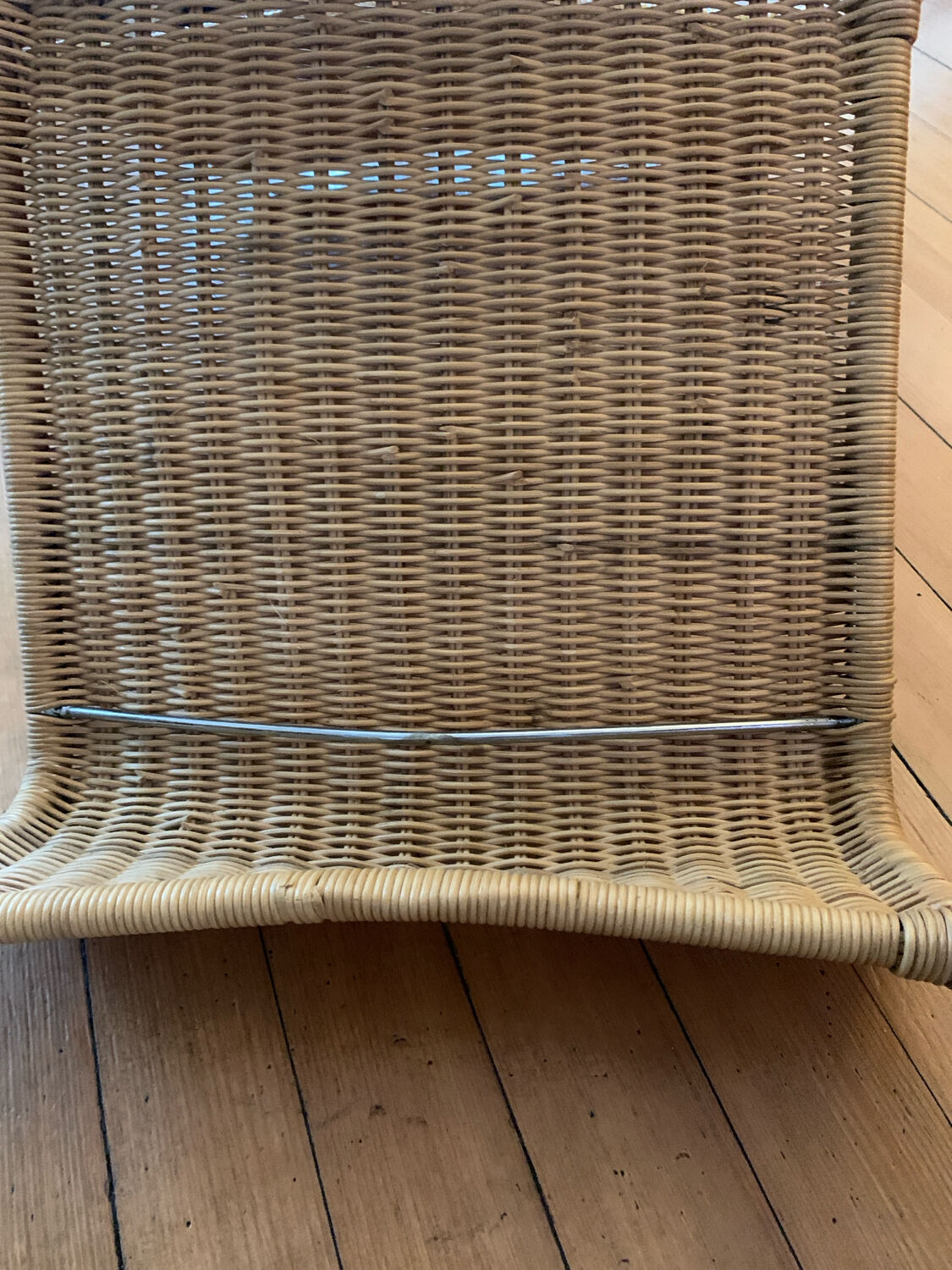 Vintage wicker and chrome chair from the 1970s.