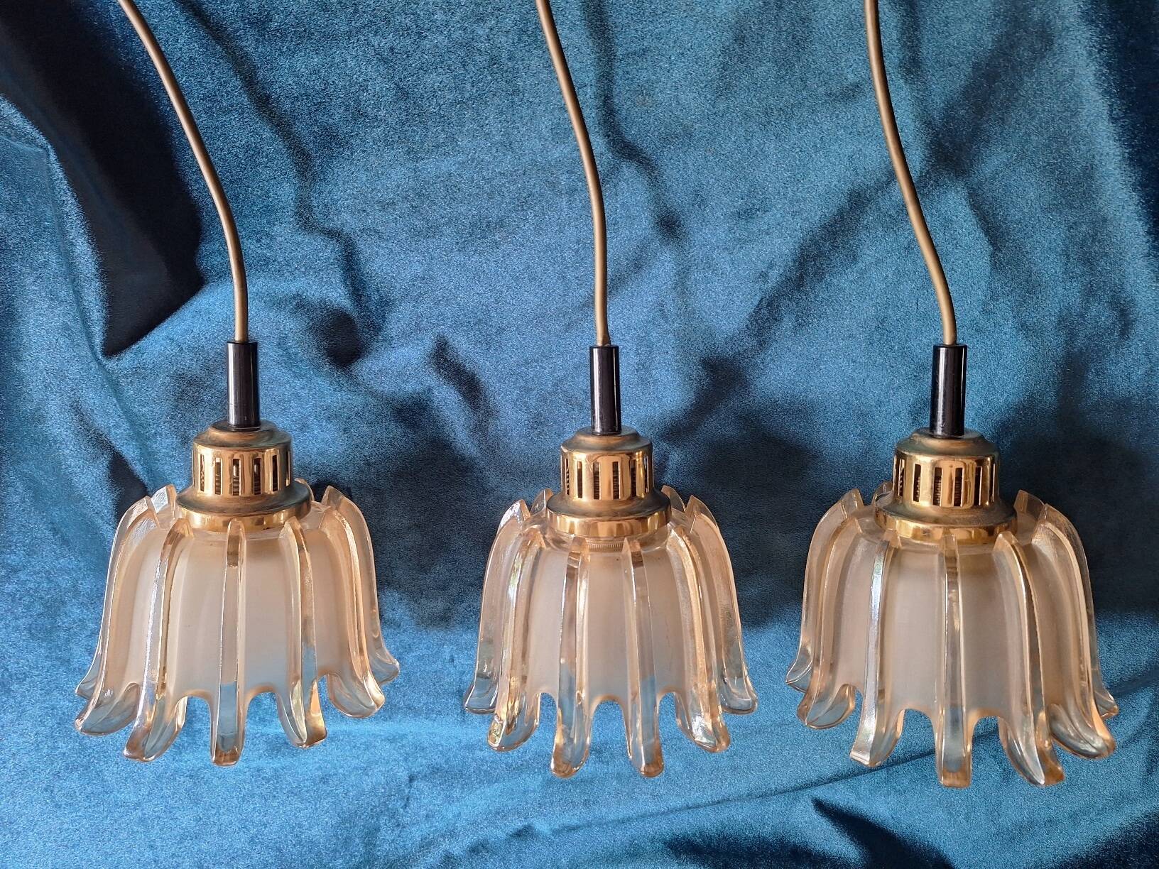 Set of 3 Doria pendant lights in brass and amber-coloured glass, 1960s