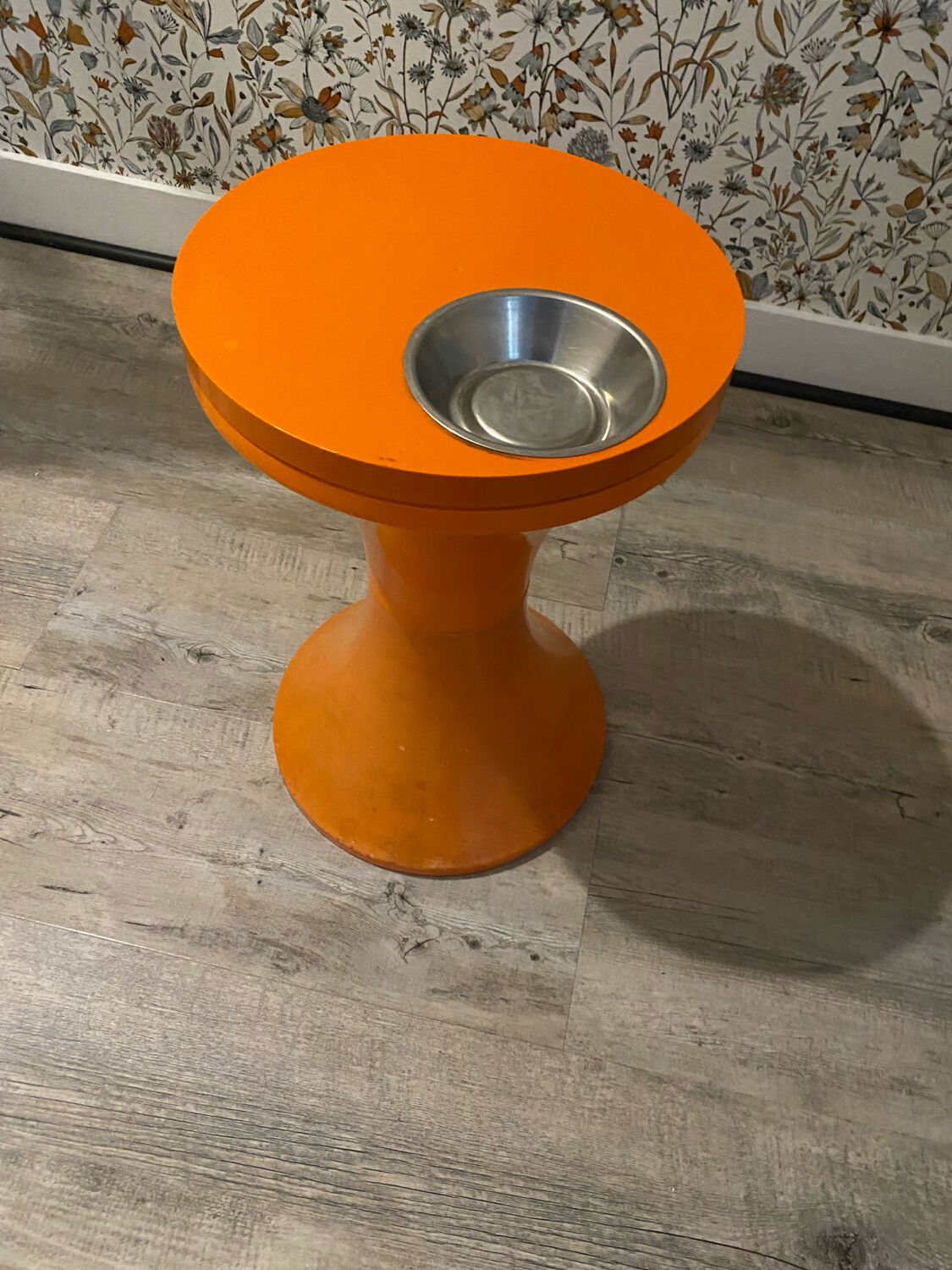 Orange tam-tam by Stamp with integrated pocket.