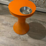 Orange tam-tam by Stamp with integrated pocket.