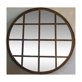 Round mirror mounted in mild steel