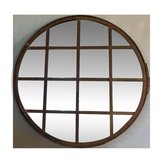 Round mirror mounted in mild steel