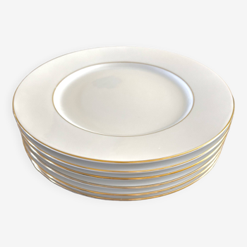 Assiettes plates en porcelaine blanches et dorées
