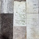 Leather carpets with rectangular geometric patterns