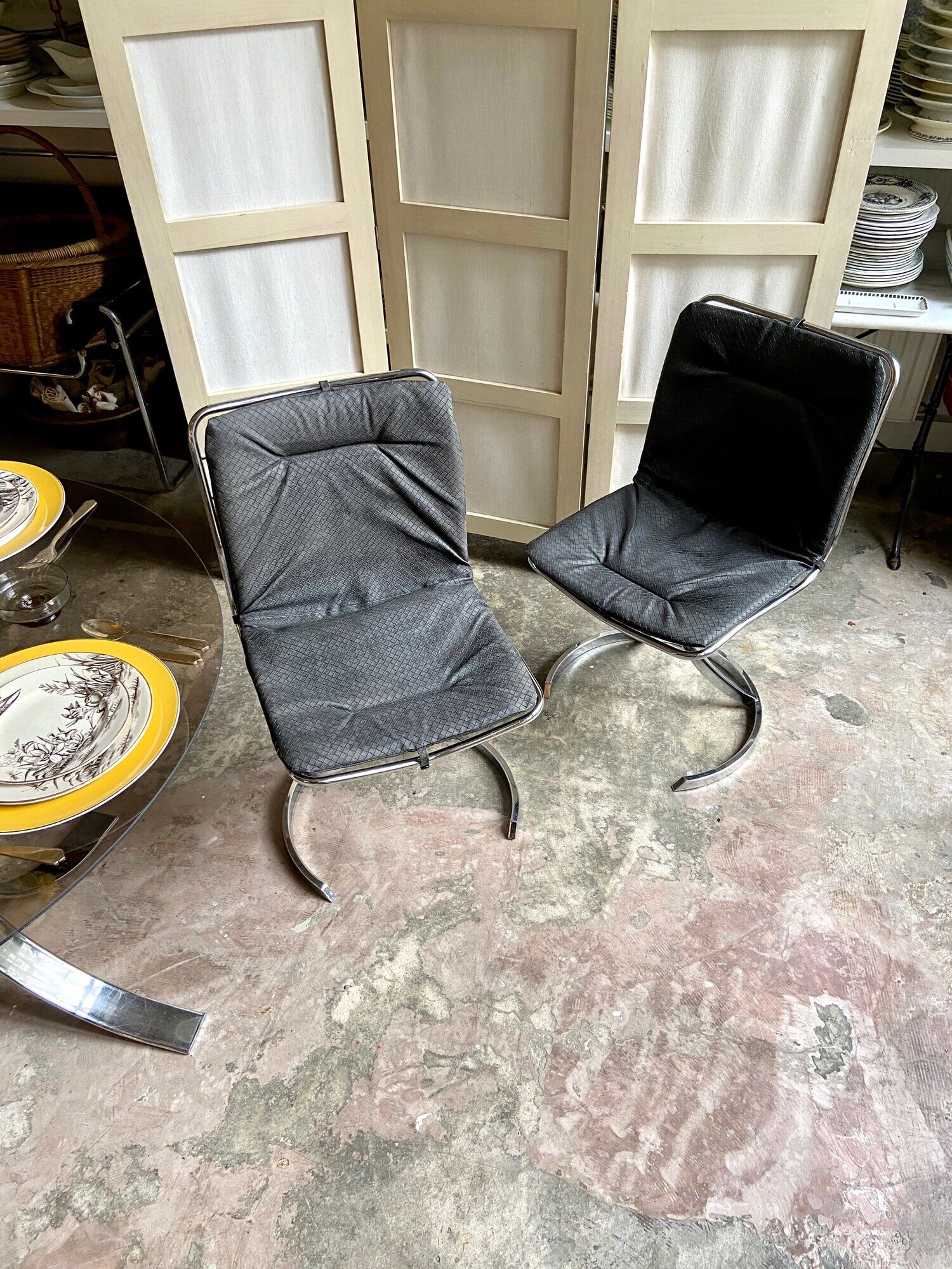 2 chairs in chromed metal and black woven skaï 1970s