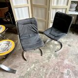 2 chairs in chromed metal and black woven skaï 1970s