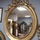 Miroir ovale en bois doré 93x73cm