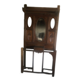 Very decorative coat rack with bevelled mirror.