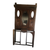 Very decorative coat rack with bevelled mirror.
