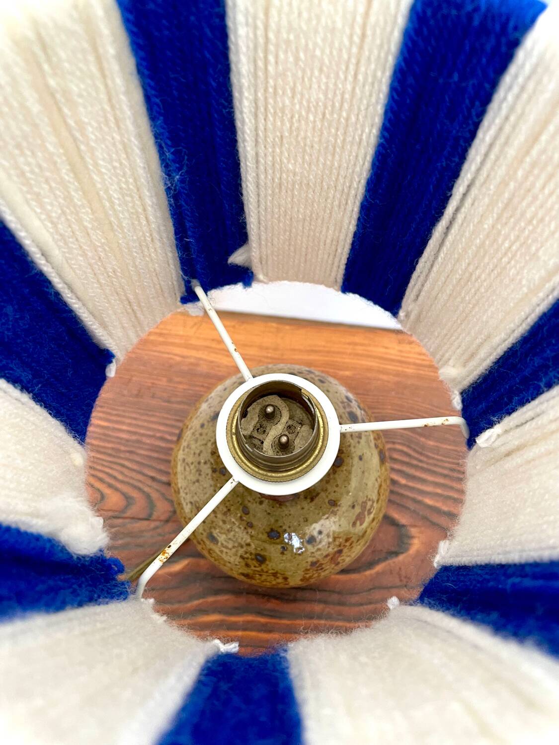 Vintage table lamp with pyrite sandstone base and striped wool lampshade