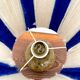 Vintage table lamp with pyrite sandstone base and striped wool lampshade