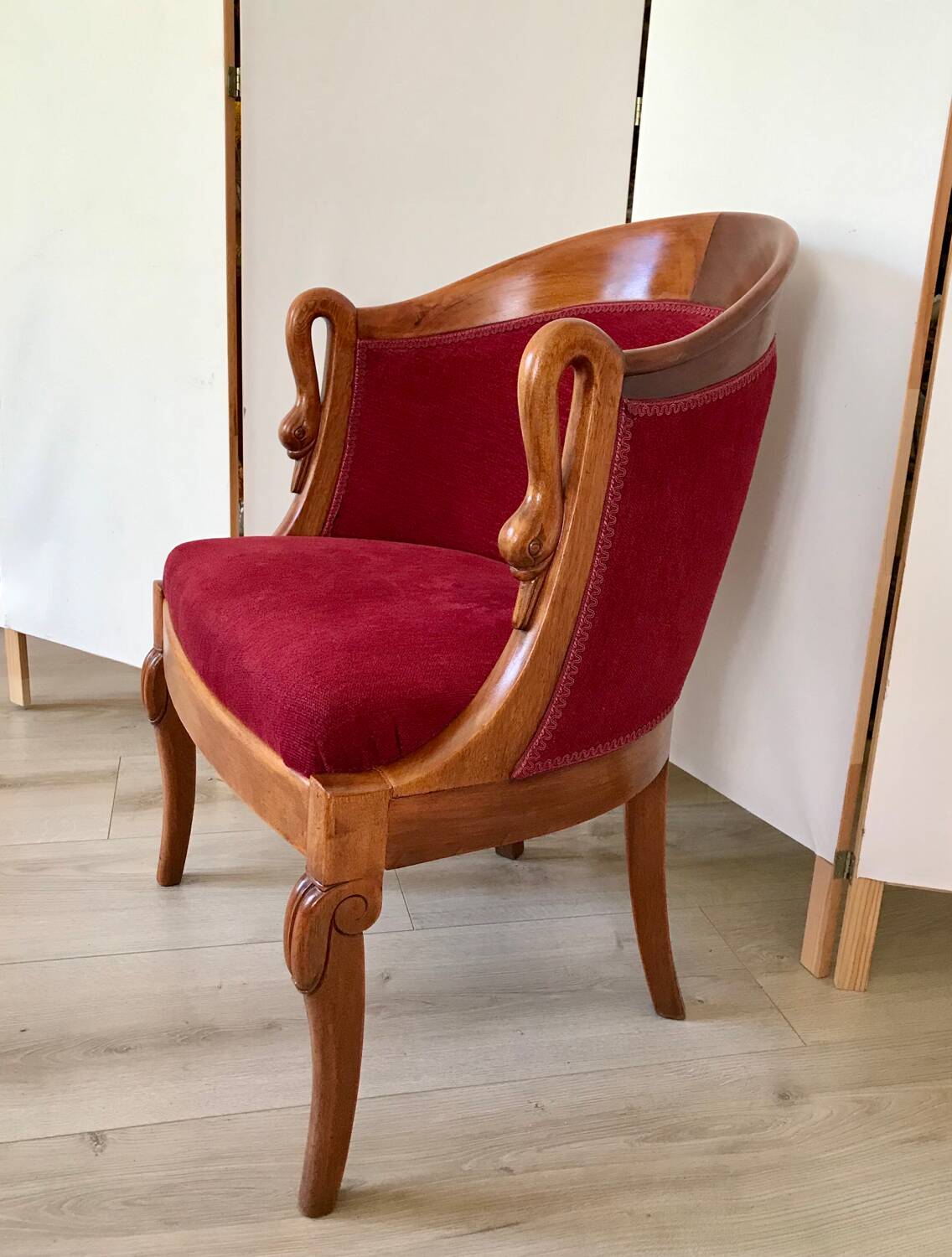 Empire-style armchair with swan necks