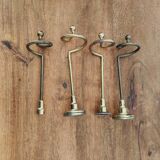 Brass curtain brackets, for draped effect
