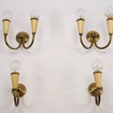 Set of four Mid-Century sconces in lacquer and brass. Italy 1950s